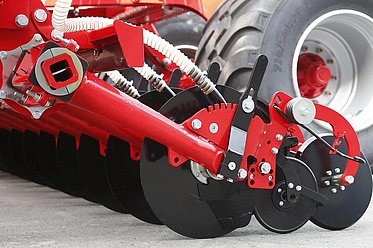 Unique rubber torsion opener mounting eliminates pivot and bushing wear points while maintaining precise soil engagement with up to 550 lbs of available down pressure.
